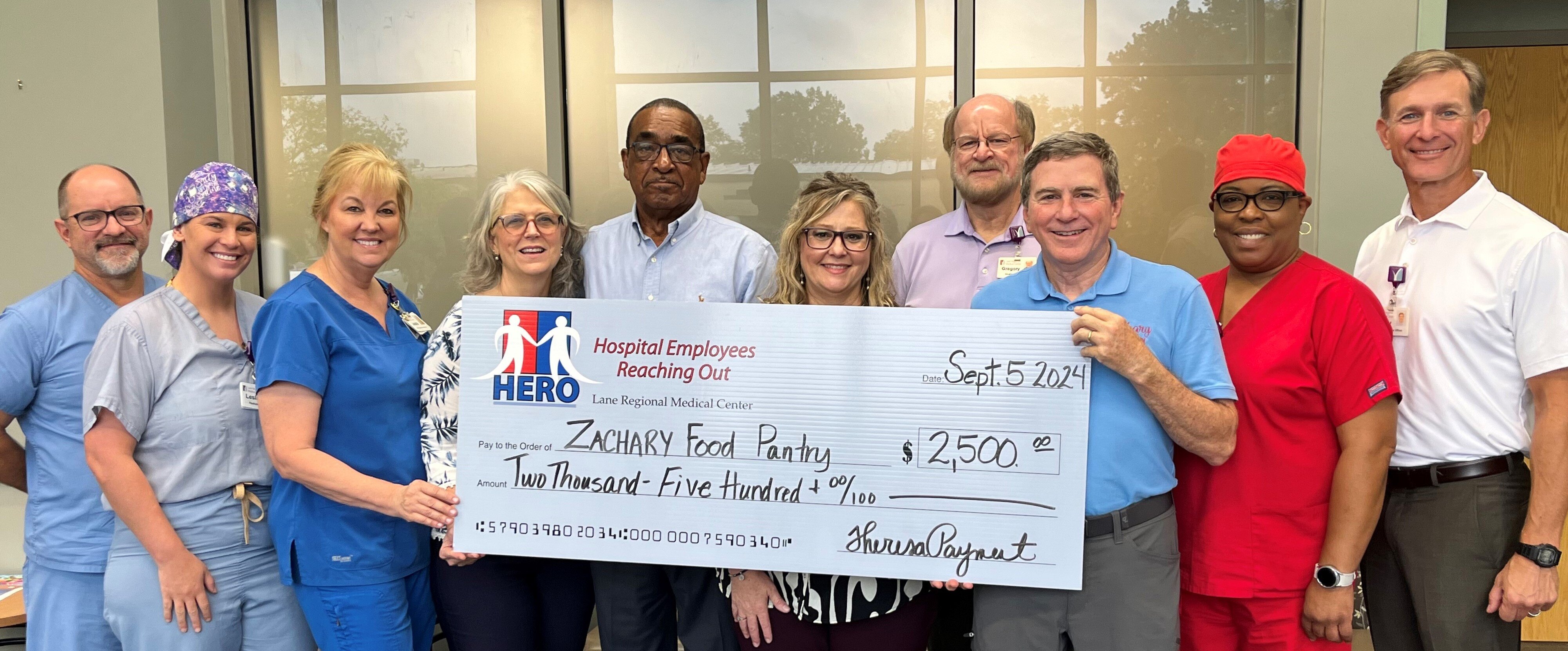 HERO Club Donates to Zachary Food Pantry